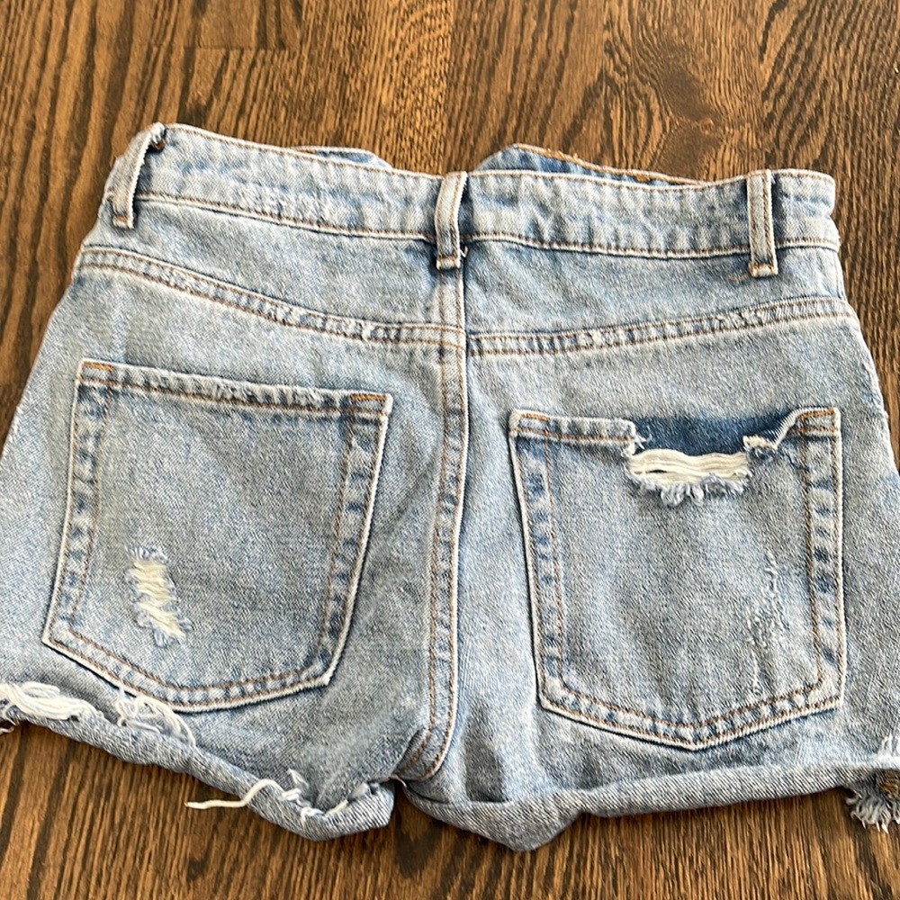 Adika jean shorts. Never worn. Distressed jean shorts size xs
